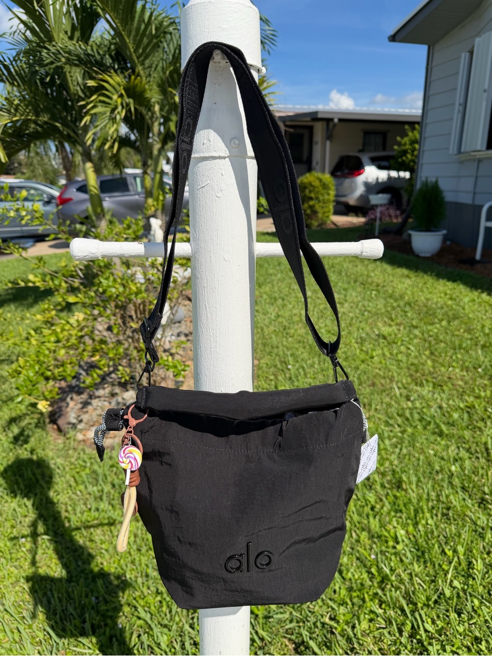 ALO Yoga Black Drawstring Mini Bucket Bag with Candy Charm - Picture 11 of 16